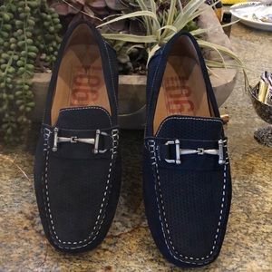 Men’s blue suede loafer.